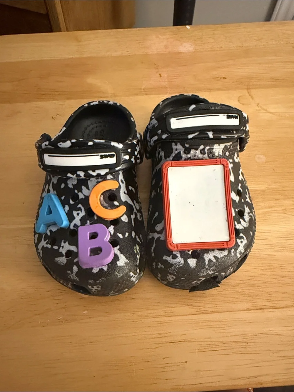 CROCS Kids Black & White Splash Slip-Ons with Colorful Letter Charms